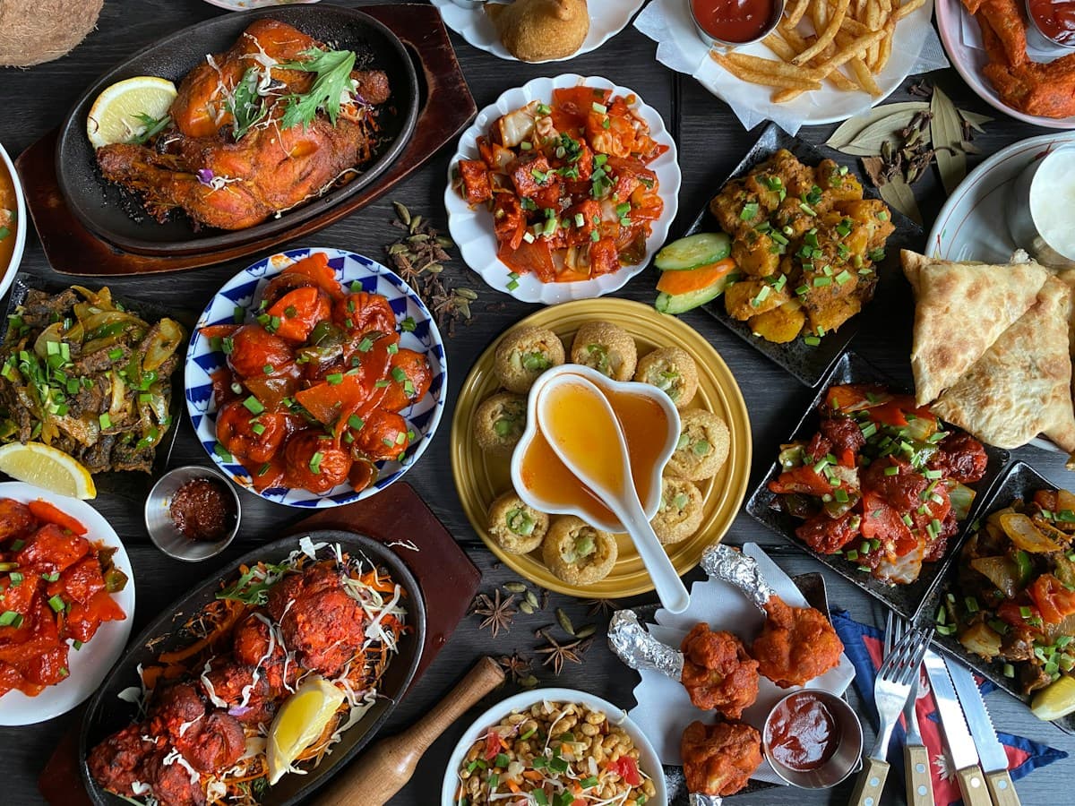 A generous table filled with colourful dishes made for sharing